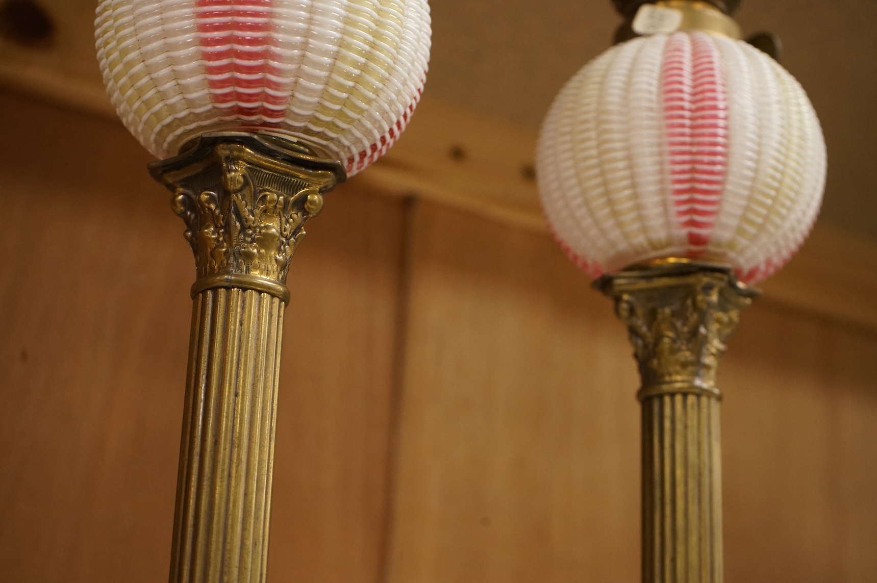 A pair of Victorian brass oil lamps with Webb style reservoirs, 33cm high